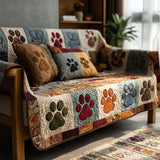 Quilted sofa cover with paws and meadow